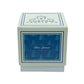 A square box labeled "Custom Candle Co" displays a blue panel with tree art and “Blue Spruce,” presenting the Holiday Scented Boxed Candle – Blue Spruce Scent for a festive, cozy vibe.