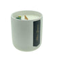 The Holiday Scented Boxed Candle – Blue Spruce Scent features white soy wax in a plain ceramic holder with a wooden wick and green ornament—labeled "Blue Spruce"—ideal as a festive candle with its seasonal fragrance.