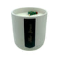 The Holiday Scented Boxed Candle – Blue Spruce Scent features white soy wax in a labeled jar with a decorative Christmas tree, filling your space with a festive holiday aroma.