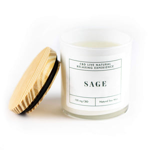 The SAGE Relaxing Aromatherapy Candle 11oz features a white glass jar with wooden lid, made from all-natural soy wax and infused with CBD for a soothing, relaxing experience.