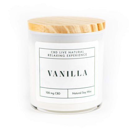 The VANILLA Relaxing Aromatherapy Candle 11oz is a white candle in a glass jar with wooden lid, labeled "Vanilla." Made from natural soy wax and infused with 100mg CBD, it offers a relaxing aromatherapy experience.