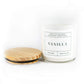 The VANILLA Relaxing Aromatherapy Candle 11oz features a soothing vanilla scent, wooden lid, 100 mg CBD, and natural soy wax—making it the perfect candle for calming aromatherapy moments.