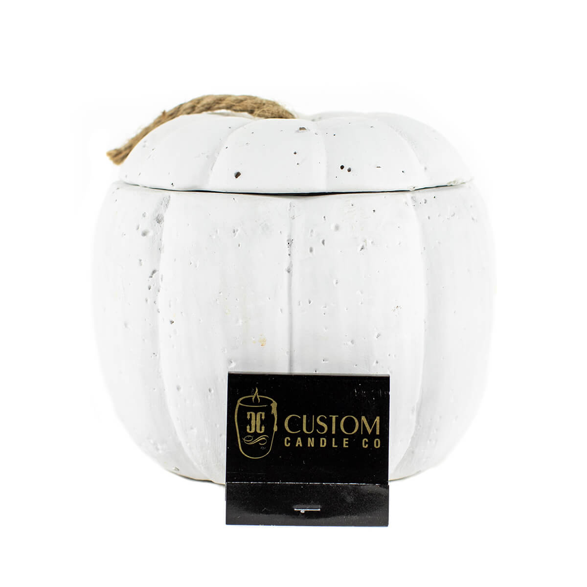 The White Cement Pumpkin Candle features a rope handle and Custom Candle Co label, adding charm to any space.