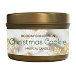 The Musical Holiday Candle – Christmas Cookie comes in a gold tin with festive cookie designs—one of the season’s most charming holiday-scented candles.