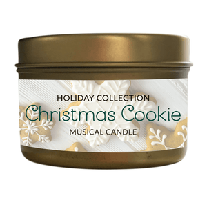 The Musical Holiday Candle – Christmas Cookie comes in a gold tin with festive cookie designs—one of the season’s most charming holiday-scented candles.
