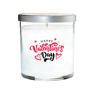 The Happy Valentines Day Quote Candle comes in a clear tumbler glass with natural white soy wax, a silver lid, and "Happy Valentine's Day" plus red heart designs on the front—perfect for Valentine’s gifts.