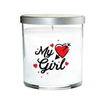 The My Girl Quote Candle is a hand-poured soy candle in a clear tumbler glass with a silver lid, featuring "My Girl" text and red heart graphics on the front.