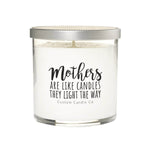 The "Mothers are Like Candles They Light The Way" soy wax candle comes in a clear glass jar with a silver lid—an ideal custom Mother's Day gift from Custom Candle Co.