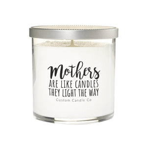 The "Mothers are Like Candles They Light The Way" soy wax candle comes in a clear glass jar with a silver lid—an ideal custom Mother's Day gift from Custom Candle Co.