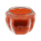 The Glass Pumpkin Pot Candle features orange wax in a grooved glass jar shaped like a pumpkin, making it the perfect soy candle for cozy Halloween decor.