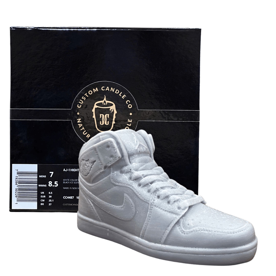 An AJ-1 Gray Sneaker Candle – Large (currently on backorder) is displayed in front of a black Custom Candle Co. box with gold and white lettering.