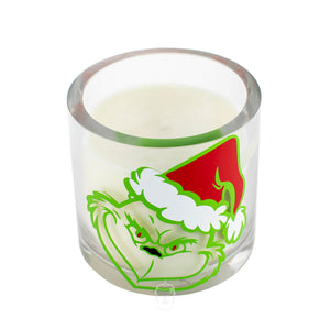 The Grinch Holiday Candle is a natural soy candle in a clear glass holder, featuring the Grinch in a red Santa hat—perfect for brightening up your space this holiday season.