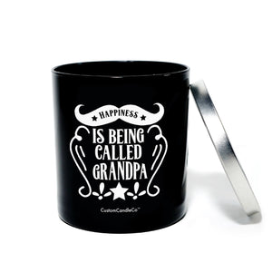 The "Happiness is Being Called Grandpa" candle is a black tin with a silver lid and white text—a natural soy candle that makes an ideal gift for Grandpa.
