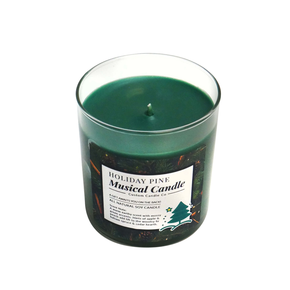 The Musical Holiday Candle – Holiday Pine is a green soy candle in a glass container with pine decorations inside the wax—ideal for anyone who loves musical Christmas candles.