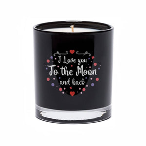The "I Love You to the Moon and back" Quote Candle comes in a black tumbler glass, featuring white text and decorative accents in red, purple, and pink.