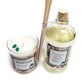 The Musical Holiday Candle & Diffuser | Jack Frost set includes a glass candle, diffuser oil bottle, and reed sticks on a white background—ideal for fans of festive, musical Christmas candles.