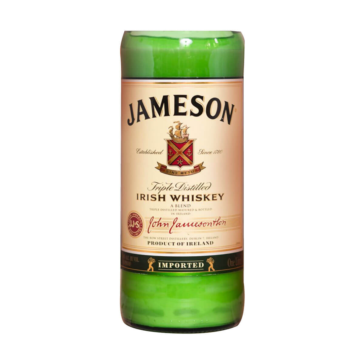 The Recycled Irish Whiskey Candle is crafted from a green glass whiskey bottle with the original Jameson label and filled with natural coconut-apricot wax.