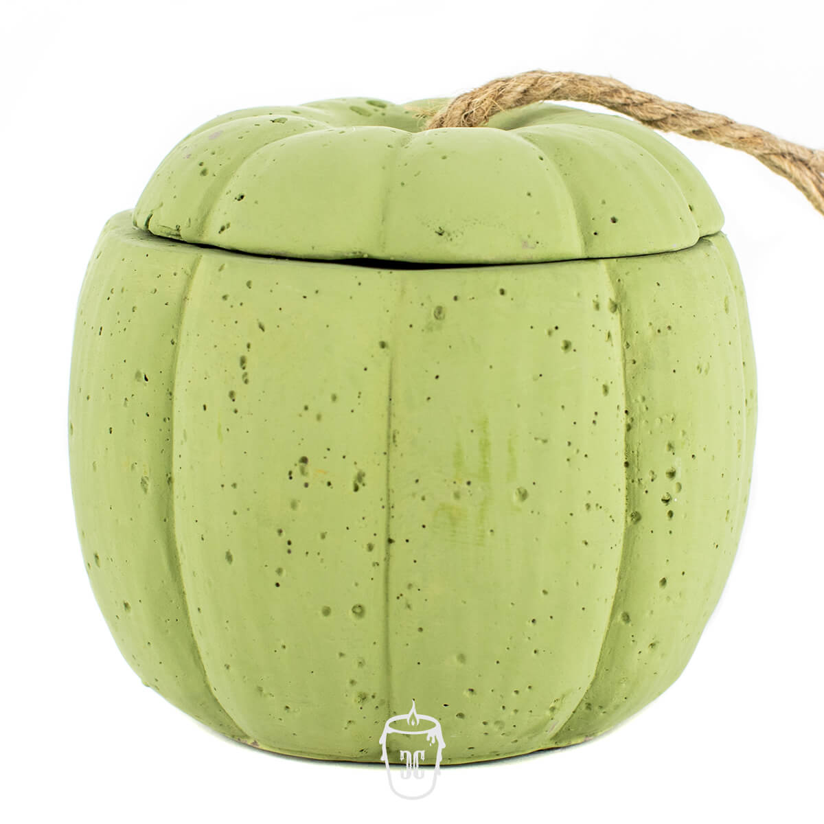 The Green Cement Pumpkin Candle features a pumpkin-shaped green cement container with a lid and a short rope handle, shown on a white background.