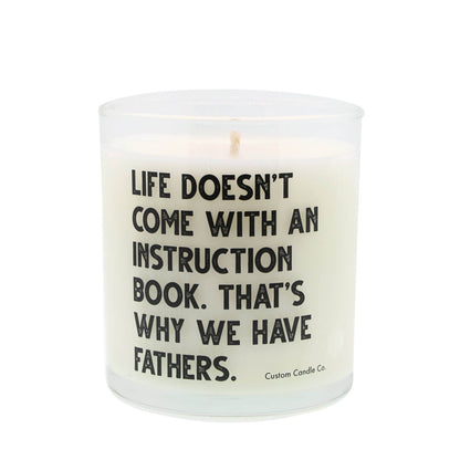 The Life Doesn’t Come With An Instruction Book. That’s Why We Have Fathers Quote Candle is a white natural soy candle in a glass jar with black text—a meaningful gift for any dad.