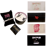 The Mother’s Day Gift Box features a lavender candle with dried flowers, a beaded bracelet on a pillow, and five decorative rectangular boxes—creating the perfect custom candle gift set.