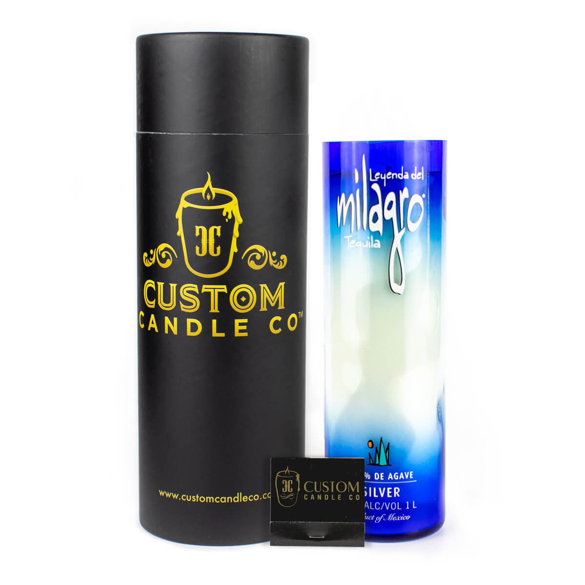 A black Custom Candle Co. cylindrical box, a Recycled Blue Agave Tequila Candle in a blue and white bottle, and a small black matchbox are displayed side by side on a white background.