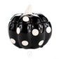 The Ceramic Mini Polka Black Pumpkin Candle features a black ceramic pumpkin with white polka dots and a white stem, making it a charming soy-scented accent for any space.