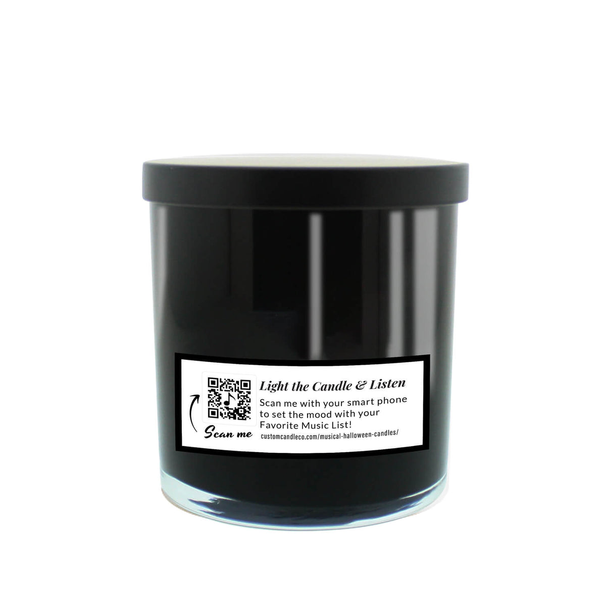 The Musical Halloween Candle – Pumpkin Pancake is a black soy scented candle in a glass jar with lid. The label reads "Light the Candle & Listen" and features a QR code linking to a playlist for a unique musical Halloween experience.