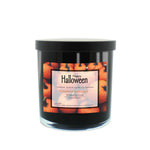 A Musical Halloween Candle – Pumpkin Pancake, in a black jar with a pumpkin-themed label that says "Happy Halloween" and "Pumpkin Pancake All Natural Soy Candle.
