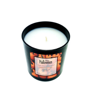 Unlit Musical Halloween Candle – Pumpkin Pancake scent, black soy wax with a single wick and pumpkin border label, shown against a white background.