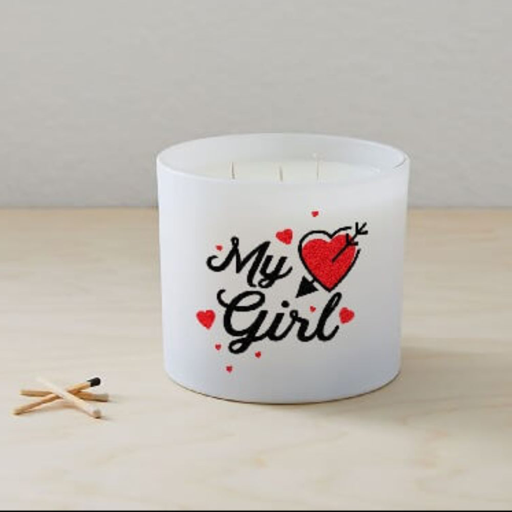 The My Girl Quote Candle (Frosted tumbler jar) features "My Girl" and a red heart with an arrow, hand poured from soy wax, displayed on a light wooden surface beside three matches.