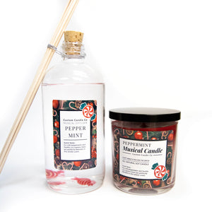 The Musical Holiday Candle & Diffuser | Peppermint features a glass candle and reed diffuser, both with festive peppermint scent, ideal for brightening your space this season.