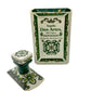 The Recycled Ceramic Tequila Candle – Flat Cut features a ceramic tequila bottle with green floral patterns, repurposed with coconut-apricot wax. 100% agave, 1L, 40% Alc./Vol.—perfect for unique candle decor.