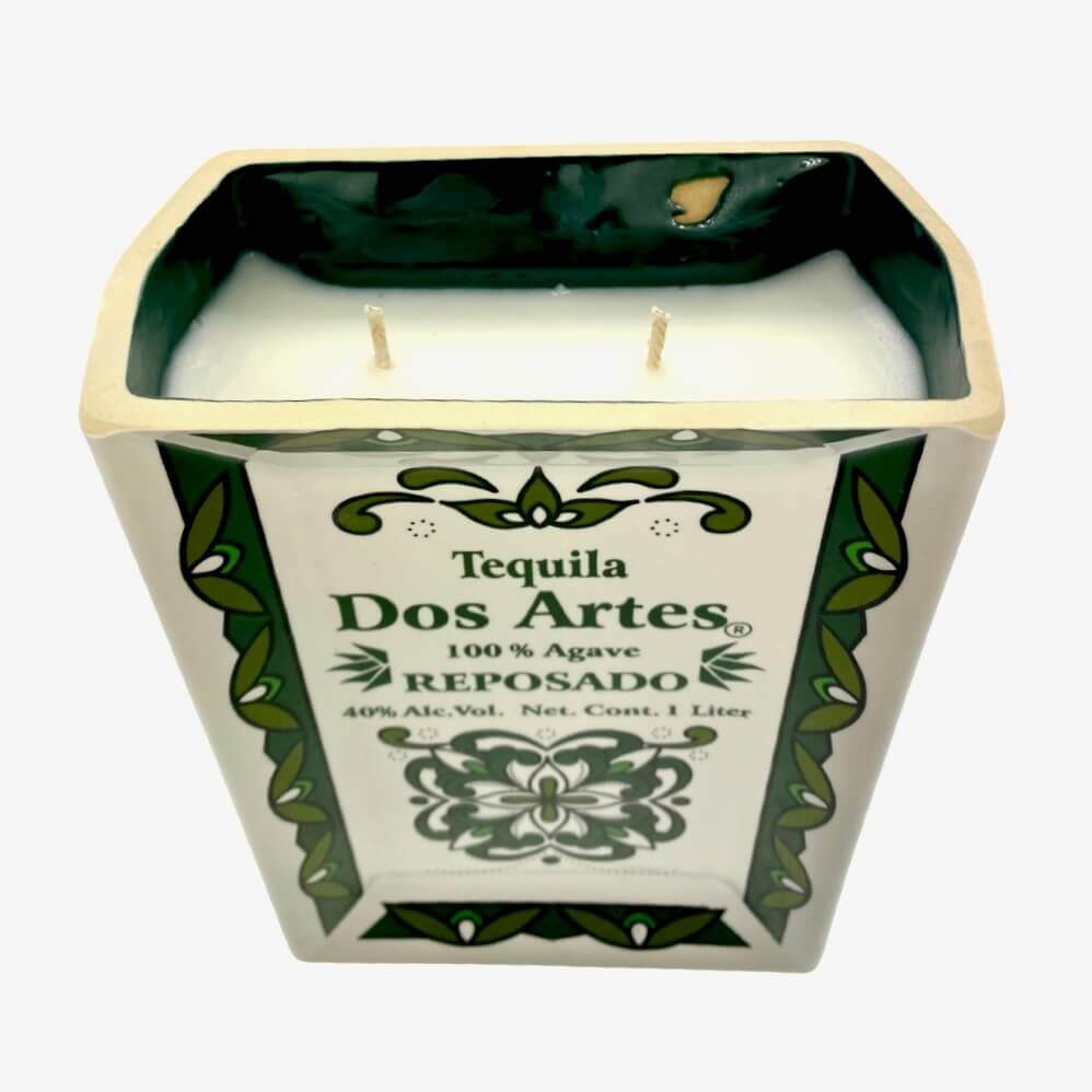 The Recycled Ceramic Tequila Candle – Flat Cut features two wicks and coconut-apricot wax, set in a rectangular, recycled ceramic vessel inspired by Dos Artes Reposado tequila bottles.