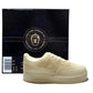 The AF1 – White Lowtop Sneaker Candle – Large (On Backorder) is a sneaker-shaped candle in fresh Black Ice fragrance, shown before a black Custom Candle Co. box labeled "Natural Soy Candle.