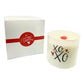 The XOXO Colored Quote Candle comes in a hand-poured frosted tumbler jar with "xoxo" and red hearts, paired with a white box featuring a red "My Valentine" label—an ideal gift for Valentine's Day.